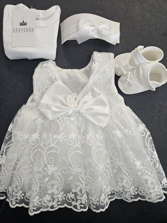 Christening dress by Pugi Baby